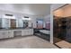 Luxurious bathroom featuring a double vanity, soaking tub, and separate shower for a spa-like experience at 13014 N 23Rd Pl, Phoenix, AZ 85022