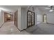 Hallway featuring decorative archways leading to living spaces at 13014 N 23Rd Pl, Phoenix, AZ 85022