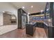 Modern kitchen with stainless steel appliances, a center island, and ample cabinet space at 13014 N 23Rd Pl, Phoenix, AZ 85022