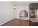 Spacious kitchen with stainless steel appliances and marble countertops, leading to a dining and lounge area at 13014 N 23Rd Pl, Phoenix, AZ 85022