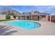 Enjoy the sparkling pool and covered patio with mountain views, perfect for entertaining or relaxing at 13014 N 23Rd Pl, Phoenix, AZ 85022