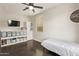 Bedroom featuring storage units, with a window providing natural light at 13225 W Rowel Rd, Peoria, AZ 85383