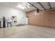Spacious garage with ample storage cabinets and epoxy flooring at 1407 E Artemis Trl, San Tan Valley, AZ 85140