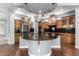 Gorgeous kitchen with a large island, stainless steel appliances, and custom cabinetry at 1407 E Artemis Trl, San Tan Valley, AZ 85140