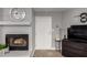 Close up of the fireplace, white door, and display area with gray paint at 16402 N 31St St # 102, Phoenix, AZ 85032