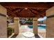 Charming poolside cabana offers shade and seating, enhancing the community pool area at 16402 N 31St St # 102, Phoenix, AZ 85032