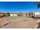 Outdoor tennis court with surrounding residential buildings, set against a beautiful blue sky at 16402 N 31St St # 102, Phoenix, AZ 85032