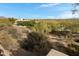 View of the backyard with desert landscaping and a fence surrounding the property at 16522 E Glenbrook Blvd, Fountain Hills, AZ 85268