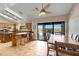 Bright kitchen with granite countertops, breakfast bar, stainless appliances, and dining area with backyard view at 16522 E Glenbrook Blvd, Fountain Hills, AZ 85268