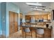 Spacious kitchen featuring a large island, stainless steel appliances, and custom cabinetry at 16522 E Glenbrook Blvd, Fountain Hills, AZ 85268