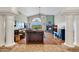 Open living room with high ceilings, hardwood floors, and a tiled fireplace at 16522 E Glenbrook Blvd, Fountain Hills, AZ 85268