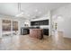 Kitchen area features a butcher block island, stainless steel appliances, and access to the patio at 17201 N Chance Dr, Surprise, AZ 85374