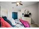 Bedroom featuring ceiling fan, neutral decor, and en suite at 19700 N 76Th St # 2044, Scottsdale, AZ 85255