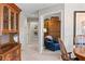 Elegant dining room featuring hardwood furniture and an adjacent doorway to a sitting room at 19700 N 76Th St # 2044, Scottsdale, AZ 85255