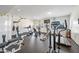 Well-equipped community gym featuring treadmills, elliptical machines, and weightlifting equipment at 19700 N 76Th St # 2044, Scottsdale, AZ 85255