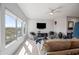 Inviting living room with large windows offering natural light and comfortable furnishings at 19700 N 76Th St # 2044, Scottsdale, AZ 85255