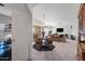 Open-concept living room and dining area with access to the balcony through sliding doors at 19700 N 76Th St # 2044, Scottsdale, AZ 85255