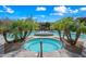 Stunning community pool and spa surrounded by palm trees and lush landscaping at 19700 N 76Th St # 2044, Scottsdale, AZ 85255