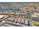 Panoramic aerial view of a sprawling community with lakes, parks, and recreational amenities at 20056 N 107Th Ln, Peoria, AZ 85373