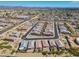Aerial perspective of a residential neighborhood with a golf course and well-maintained landscaping at 20056 N 107Th Ln, Peoria, AZ 85373