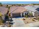 Charming single-story home with two-car garage, neat landscaping, and tile roofing at 20056 N 107Th Ln, Peoria, AZ 85373