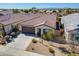 Charming single-story home with tile roof, neat landscaping, and a convenient two-car garage at 20056 N 107Th Ln, Peoria, AZ 85373