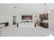Spacious kitchen features dark cabinetry, granite counters, and a large island with bar seating at 20056 N 107Th Ln, Peoria, AZ 85373