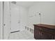 Mud room with built-in bench, storage, and a convenient coat rack at 20056 N 107Th Ln, Peoria, AZ 85373