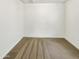 Clean bedroom showcasing neutral carpeting and blank walls for customization at 2181 W Harmont Dr, Phoenix, AZ 85021