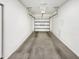 Spacious two-car garage with an automatic door and ample room for storage at 2181 W Harmont Dr, Phoenix, AZ 85021