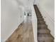 Entrance to the townhome shows the staircase and tile flooring at 2181 W Harmont Dr, Phoenix, AZ 85021