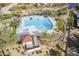 Aerial view of the community pool with pool house and spa, providing a resort-like experience at 2367 W Dusty Wren Dr, Phoenix, AZ 85085