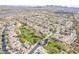 Aerial view of neighborhood with community park and pool with surrounding mountain views at 2367 W Dusty Wren Dr, Phoenix, AZ 85085