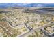 Aerial view of the community showcasing the neighborhood layout and mountain views at 2367 W Dusty Wren Dr, Phoenix, AZ 85085