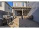 This backyard features a grill, covered outdoor dining, and a seating area at 2367 W Dusty Wren Dr, Phoenix, AZ 85085