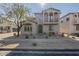 Two-story home with a balcony and well-maintained desert landscaping at 2367 W Dusty Wren Dr, Phoenix, AZ 85085