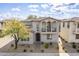 Charming two-story home with a private balcony, desert landscaping, and a welcoming entryway at 2367 W Dusty Wren Dr, Phoenix, AZ 85085