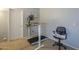 Work from home space with desk, treadmill, and office chair at 2367 W Dusty Wren Dr, Phoenix, AZ 85085