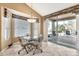 Cozy breakfast nook with large sliding doors leading to the outdoor patio area, perfect for enjoying meals at 25043 S Hollygreen Dr, Sun Lakes, AZ 85248