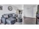 Comfortable living room featuring neutral colors, modern decor, and wood-look flooring at 2505 E Hampton Ave, Mesa, AZ 85204