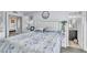 Inviting main bedroom with a luxurious bed, coordinated decor, and ample natural light at 2505 E Hampton Ave, Mesa, AZ 85204