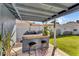 Outdoor covered patio featuring a built-in bar, perfect for entertaining guests at 2505 E Hampton Ave, Mesa, AZ 85204