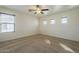 Bedroom featuring a ceiling fan, carpeted floors, and lots of natural light at 2506 E Bridgeport Pkwy, Gilbert, AZ 85295