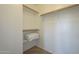 Walk-in closet features built-in shelving and ample space for storage at 2506 E Bridgeport Pkwy, Gilbert, AZ 85295