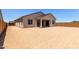 Spacious backyard area ready for customization, featuring a covered patio at 25393 N 158Th Ct, Surprise, AZ 85387