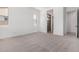 Bright bedroom with neutral carpet, white walls, and a small window at 25393 N 158Th Ct, Surprise, AZ 85387