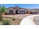 Beautiful single-story home with a two-car garage and desert landscaping at 25393 N 158Th Ct, Surprise, AZ 85387