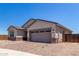 Attractive single-Gathering home with a two-car garage and brick-paved driveway at 25393 N 158Th Ct, Surprise, AZ 85387