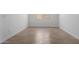 An additional room with light wood look tile and natural light at 25393 N 158Th Ct, Surprise, AZ 85387