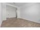 Open room with neutral walls and light wood-look tile at 25393 N 158Th Ct, Surprise, AZ 85387
